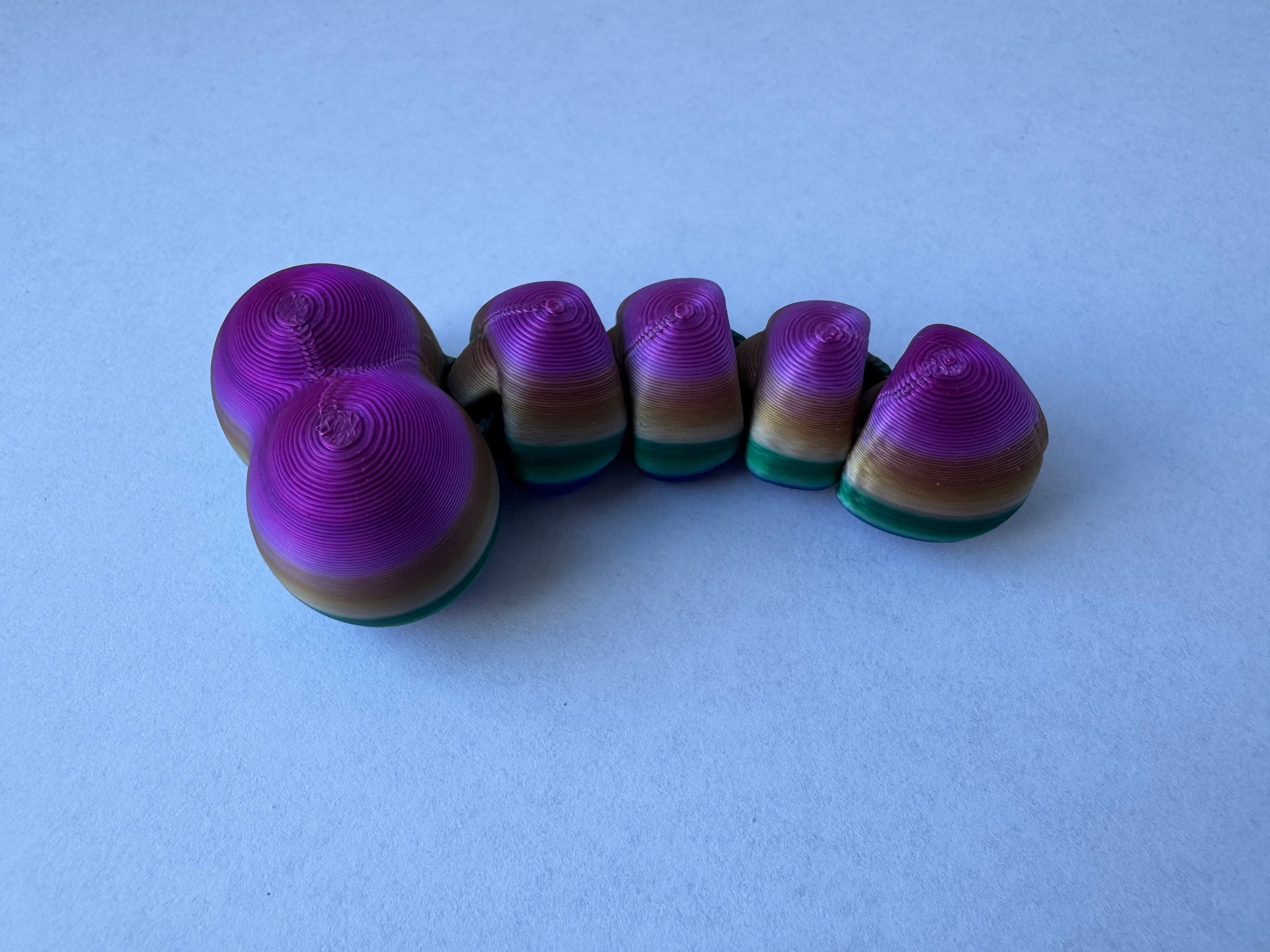 Articulated piemel fidget toy