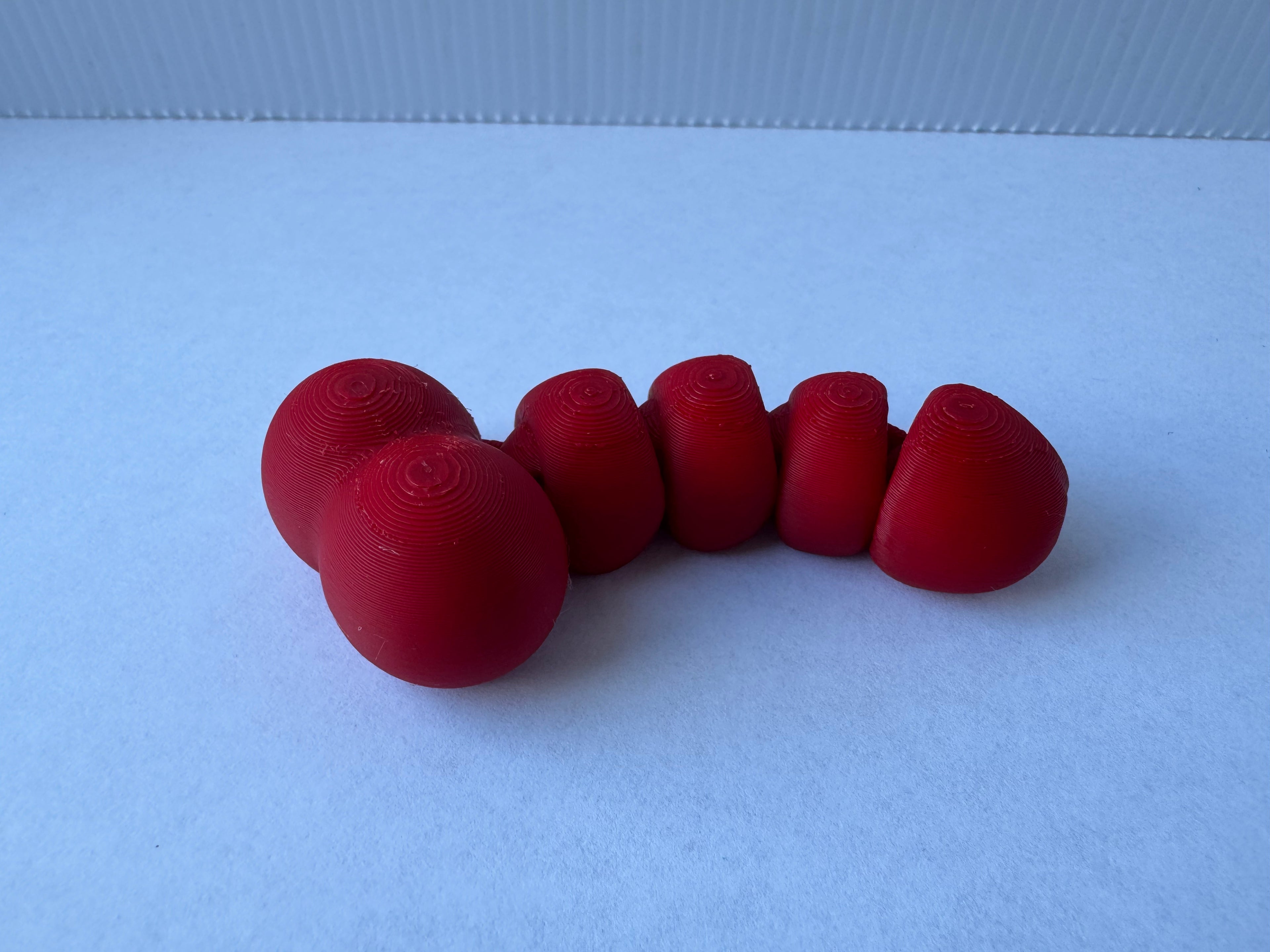Articulated piemel fidget toy